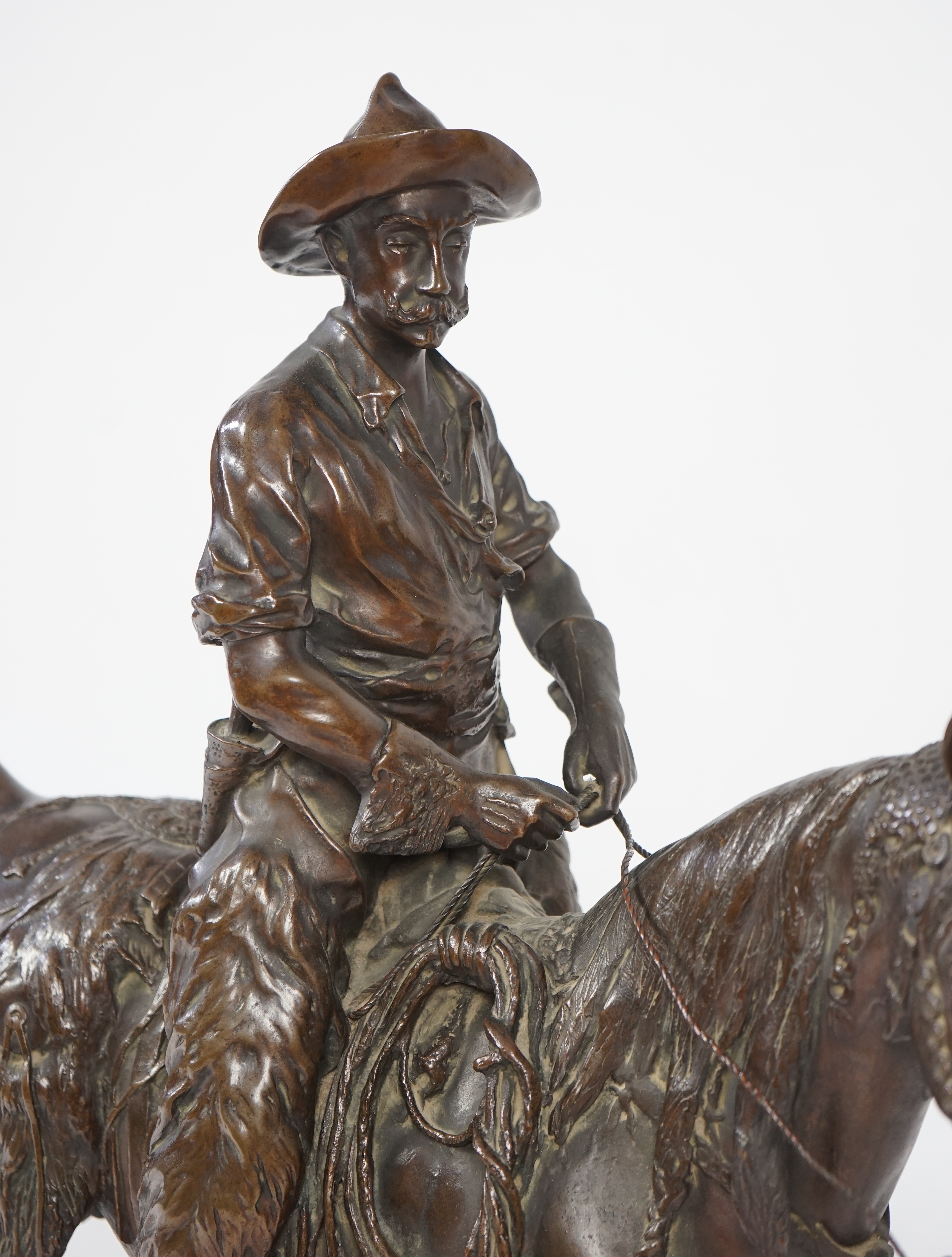 Walter Winans (St. Petersburg, 1852-Parsloe Park, Essex, 1920), a cast bronze of the artist, as a cowboy, riding the Arab stallion Skowronek, 50cm wide, 66cm high, overall 79.5cm high